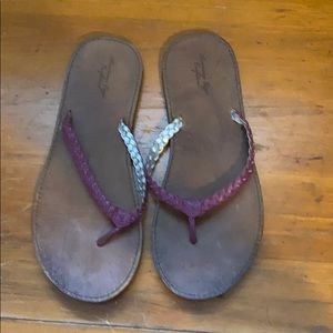 American Eagle flip flops.